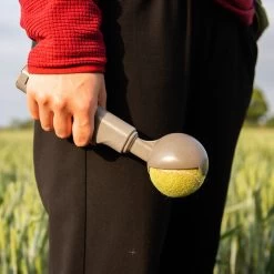 Kompact 9 Retractable Dog Ball Launcher -Dog Supply Shop product image in situ hold
